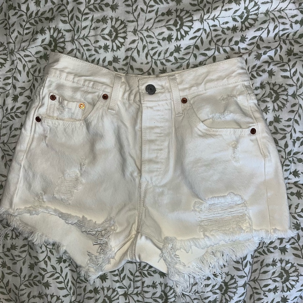 Levi’s High-Rise White Distressed Denim Shorts